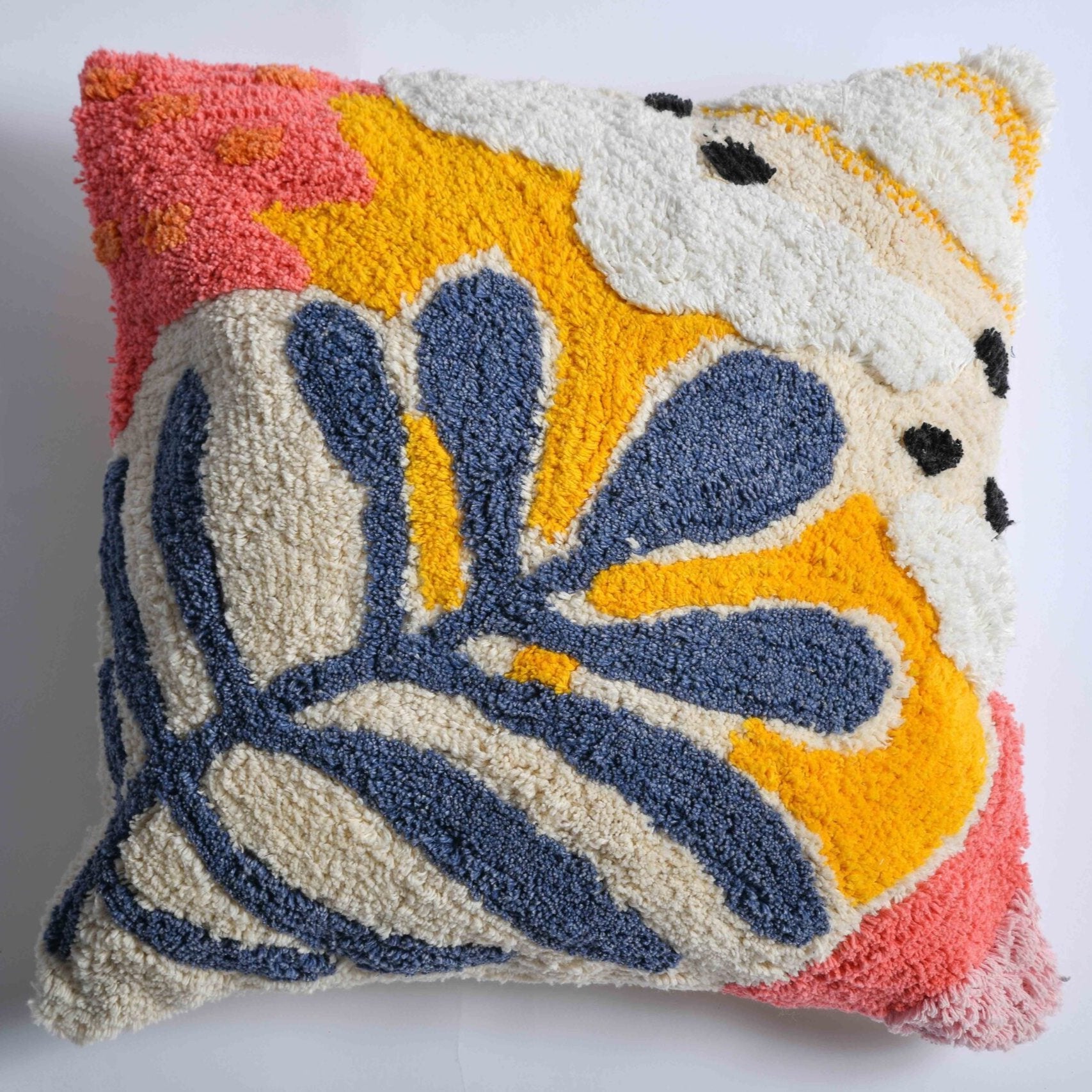 front view of the cushion cover.Beautiful design with different combination of colors. Yellow, White, Blue, Pink and Orange.Leaf kind of design.