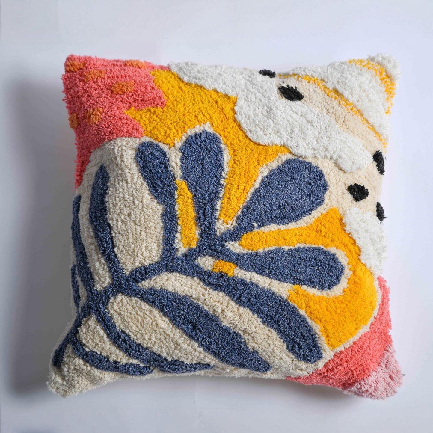Front view of cushion cover. Beautiful design with different combination of colors. Yellow, White, Blue, Pink and Orange.Leaf kind of design.